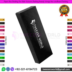 A black paper box packing for hair scissor packing beauty storage box with a logo and text on the front, displayed against a colorful background.